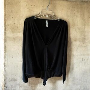 Free People Intimately V Neck Long Sleeve Body Suit.